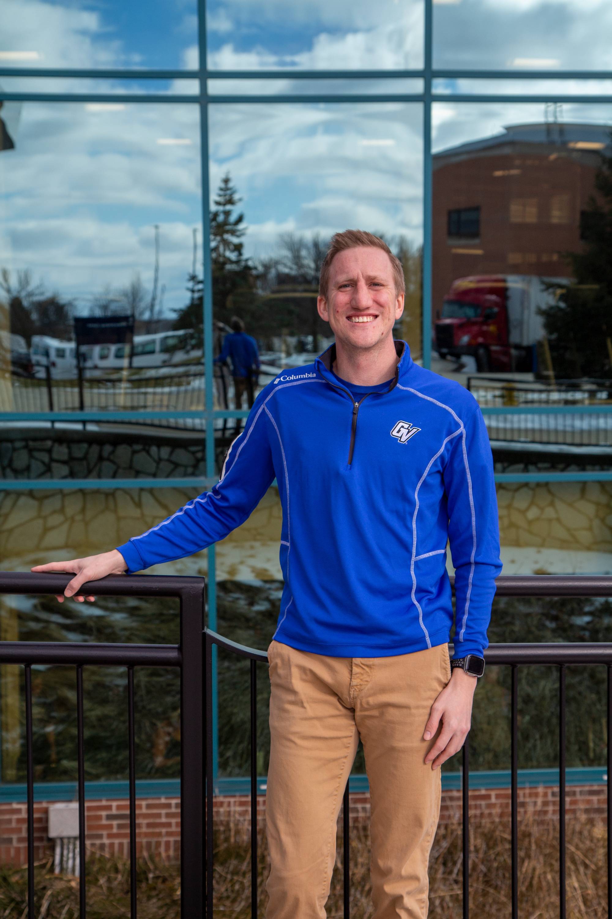 Andrew poses outside the Rec Center